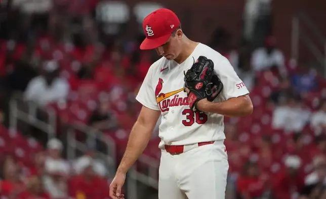 St. Louis Cardinals starting pitcher Michael McGreevy pauses after giving up an RBI single to Texas Rangers' Joc Pederson during the fifth inning of a baseball game Monday, June 1, 2026, in St. Louis. (AP Photo/Jeff Roberson)