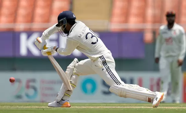 India's debutant Manav Suthar bats on day two of the cricket test match between Afghanistan and India in New Chandigarh, India, Sunday, June 7, 2026. (AP Photo/Ashwini Bhatia)