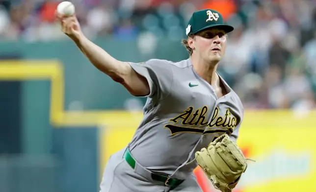 Athletics starting pitcher Jack Perkins throws against the Houston Astros during the first inning of a baseball game Friday, June 5, 2026, in Houston. (AP Photo/Michael Wyke)