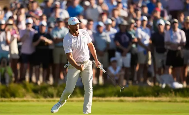 Wyndham Clark celebrates after a birdie on the 16th hole during the final round of the U.S. Open golf tournament at Shinnecock Hills Golf Club in Southampton, N.Y., Sunday, June 21, 2026. (AP Photo/George Walker IV)