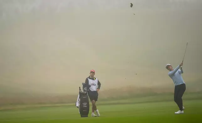 Jackson Suber hits from the fairway on the first hole during the first round of the U.S. Open golf tournament at Shinnecock Hills Golf Club in Southampton, N.Y., Thursday, June 18, 2026.(AP Photo/David J. Phillip)