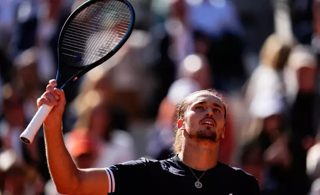 Germany's Alexander Zverev reacts after winning the semifinal tennis match against Czech Republic's Jakub Mensik at the French Open in Paris, Friday, June 5, 2026. (AP Photo/Christophe Ena)