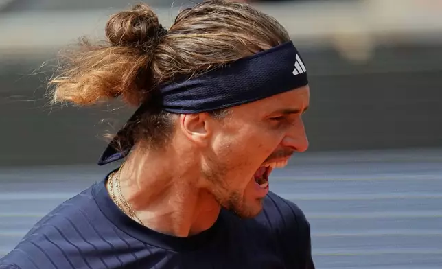Germany's Alexander Zverev reacts during the semifinal tennis match against Czech Republic's Jakub Mensik at the French Open in Paris, Friday, June 5, 2026. (AP Photo/Christophe Ena)