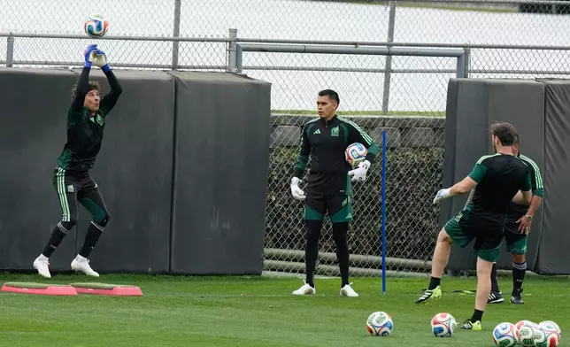 Mexico's goalkeeper Guillermo Ochoa stops shot during a training in Mexico City, Wednesday, June 10, 2026, ahead of Mexico's opening match against South Africa at the FIFA World Cup. (AP Photo/Fernando Llano)