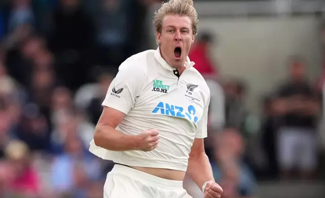 New Zealand's Kyle Jamieson celebrates taking the wicket of England's Jamie Smith during the first day of the test match between England and New Zealand at Lord's cricket ground in London, Thursday, June 4, 2026. (AP Photo/Kirsty Wigglesworth)