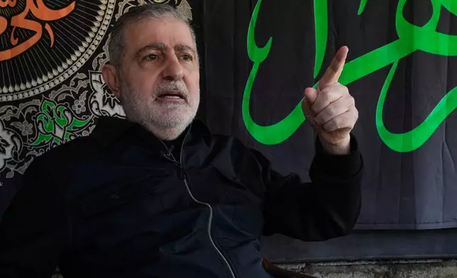 FILE - Wafiq Safa, senior Hezbollah political council member, gestures as he speaks during an interview with The Associated Press in Beirut, April 13, 2026. (AP Photo/Hussein Malla, File)