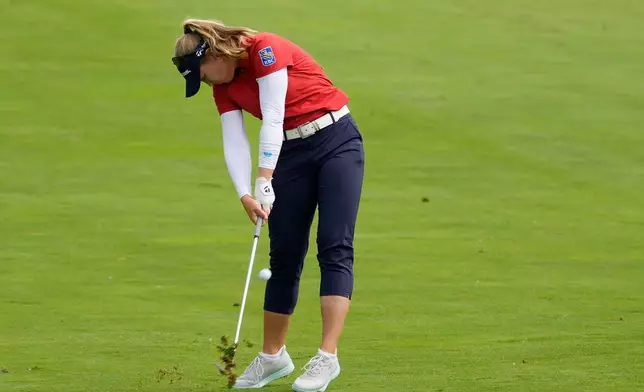 Brooke Henderson, of Canada, hits from the 18th fairway during the second round of the Women's PGA Championship golf tournament, Friday, June 26, 2026, in Chaska, Minn. (AP Photo/Chris Carlson)