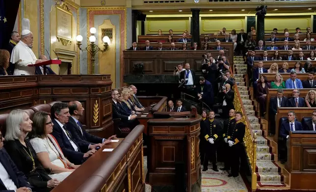 Pope Leo XIV delivers his speech as he meets with members of the Spanish Parliament at the Congress of Deputies, in Madrid, Monday, June 8, 2026. (AP Photo/Alessandra Tarantino)