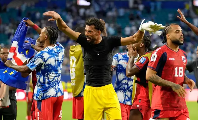 Cape Verde goalkeeper Vozinha, center, celebrates at the end of the World Cup Group H soccer match between Uruguay and Cape Verde in Miami Gardens, Fla., Sunday, June 21, 2026. (AP Photo/Lynne Sladky)