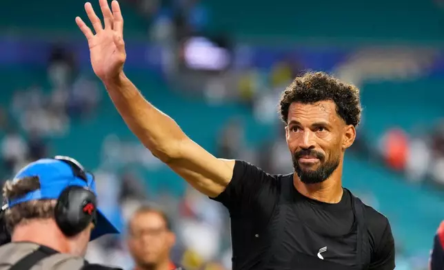 Cape Verde goalkeeper Vozinha waves to supporters following the World Cup Group H soccer match between Uruguay and Cape Verde in Miami Gardens, Fla., Sunday, June 21, 2026. (AP Photo/Rebecca Blackwell)
