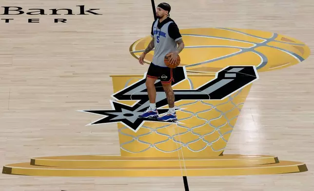 New York Knicks guard Jose Alvarado stands on the court during a workout prior to the start of the NBA Finals basketball series against the San Antonio Spurs, Tuesday, June 2, 2026, in San Antonio. (AP Photo/David J. Phillip)