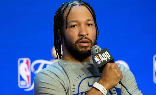 New York Knicks guard Jalen Brunson speaks with the media prior to the start of the NBA Finals basketball series against the San Antonio Spurs, Tuesday, June 2, 2026, in San Antonio. (AP Photo/Eric Gay)