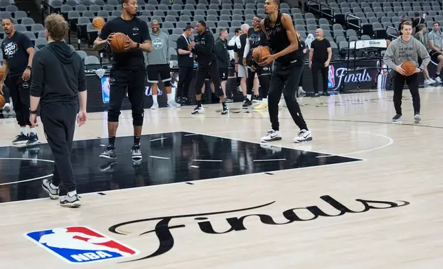 San Antonio Spurs forward Victor Wembanyama shoots free throws during a workout prior to the start of the NBA Finals basketball series against the New York Knicks, Tuesday, June 2, 2026, in San Antonio. (AP Photo/Eric Gay)