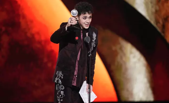 Ali Louis Bourzgui accepts the award for best performance by an actor in a featured role in a musical for "The Lost Boys" during the 79th Tony Awards on Sunday, June 7, 2026, at Radio City Music Hall in New York. (Photo by Charles Sykes/Invision/AP)