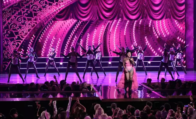 Host Pink, center, performs during the 79th Tony Awards on Sunday, June 7, 2026, at Radio City Music Hall in New York. (Photo by Charles Sykes/Invision/AP)