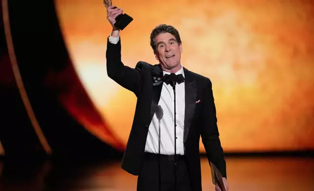 Cinco Paul accepts the award for best original score written for the theatre for "Schmigadoon!" during the 79th Tony Awards on Sunday, June 7, 2026, at Radio City Music Hall in New York. (Photo by Charles Sykes/Invision/AP)