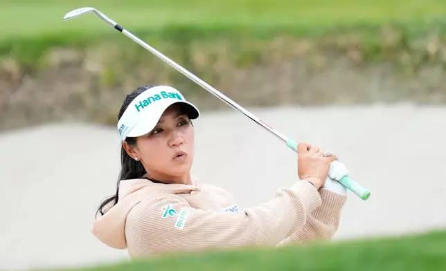 Lydia Ko, of New Zealand, reacts after hitting out of a bunker on the 14th hole during a practice round ahead of the U.S. Women's Open golf tournament Tuesday, June 2, 2026, in the Pacific Palisades area of Los Angeles. (AP Photo/Ashley Landis)