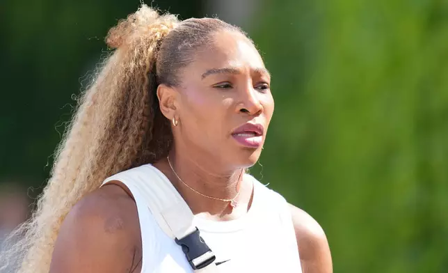 Serena Williams of the United States arrives to practice one day ahead of the start of the Wimbledon Tennis Championships in London, Sunday, June 28, 2026. (AP Photo/Kin Cheung)