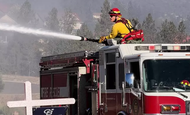 Fire crews battle the Upriver Fire on Tuesday, June 16, 2026, east of Spokane, Wash. (Spokane Valley Fire Department via AP)