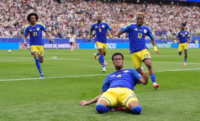 Curaçao's Livano Comenencia celebrates after scoring during the World Cup Group E soccer match between Germany and Curacao in Houston, Sunday, June 14, 2026. (AP Photo/Eric Gay)