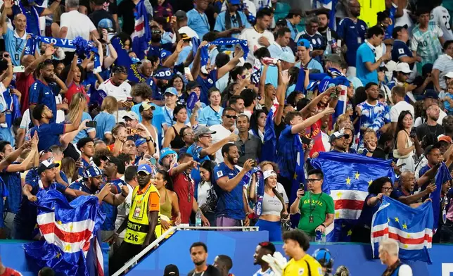 Cape Verde fans react following the World Cup Group H soccer match between Uruguay and Cape Verde in Miami Gardens, Fla., Sunday, June 21, 2026. (AP Photo/Rebecca Blackwell)