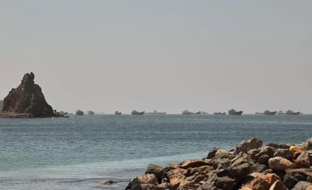 Tankers and cargo vessels are seen in the Gulf of Oman, along shipping routes linking the Strait of Hormuz and the Arabian Sea, Tuesday, June 16, 2026. (AP Photo)