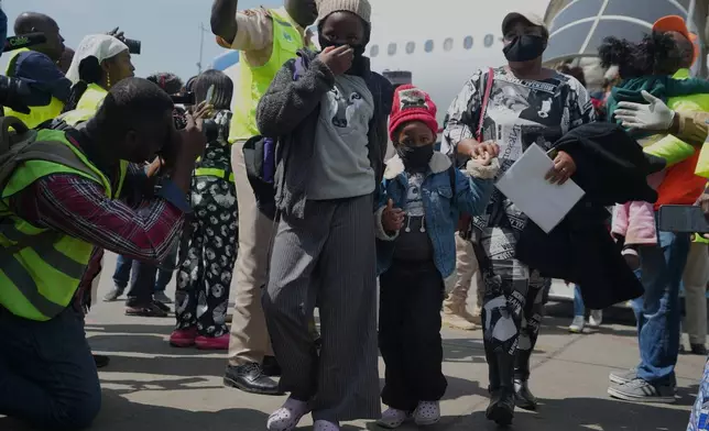 Nigerian nationals repatriated from South Africa, following concerns about unrest, arrive at the Murtala Muhammed International Airport in Lagos, Nigeria, Thursday, June 11, 2026. (AP Photo/Sunday Alamba)
