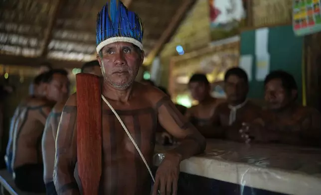 Chief Lazaro Xerente, 68, the eldest leader of the Xerente Indigenous people, attends a fire prevention operation along Brazil's environmental protection agency, IBAMA, at the Xerente territory, near Tocantinia, Tocantins state, Brazil, Tuesday, May 19, 2026. (AP Photo/Andre Penner)