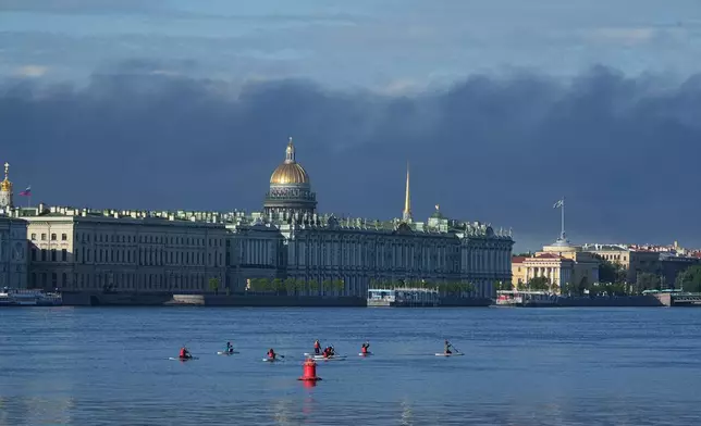 Plumes of black smoke are seen over St.Petersburg, Russia, Wednesday, June 3, 2026, after a Ukrainian drone attack. (AP Photo)