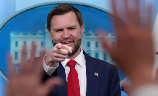 Vice President JD Vance points to a reporter to take a question in the James Brady Press Briefing Room at the White House, Thursday, June 18, 2026, in Washington. (AP Photo/Jacquelyn Martin)