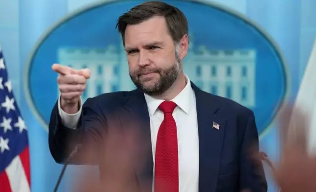 Vice President JD Vance points to a reporter to take a question in the James Brady Press Briefing Room at the White House, Thursday, June 18, 2026, in Washington. (AP Photo/Jacquelyn Martin)