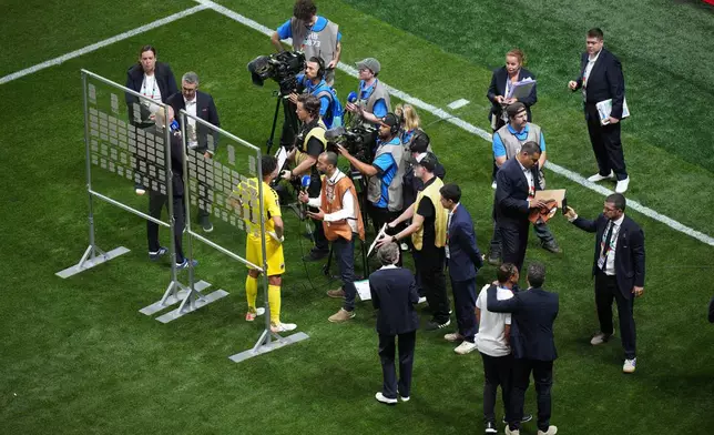 Cape Verde goalkeeper Vozinha (1) talks with the media after a tie during the World Cup Group H soccer match between Spain and Cape Verde in Atlanta, Monday, June 15, 2026. (AP Photo/Jacob Kupferman)