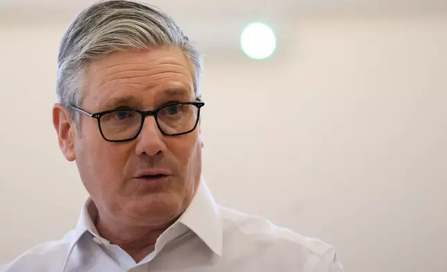 FILE - Britain's Prime Minister Keir Starmer visits a community centre in Welwyn Garden City, England, Tuesday Feb. 10, 2026. (Suzanne Plunkett/Pool Photo via AP, File)