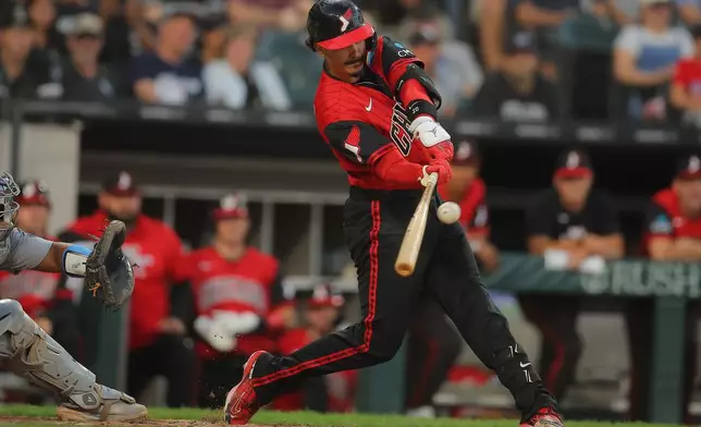 Chicago White Sox's Miguel Vargas hits a RBI double during the fifth inning of a baseball game against the Los Angeles Dodgers, Friday, June 12, 2026, in Chicago. (AP Photo/Melissa Tamez)