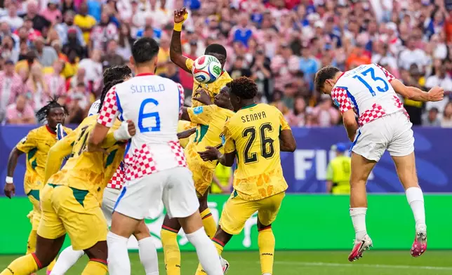 Croatia's Nikola Vlasic (13) scores his side's second goal during the World Cup Group L soccer match between Croatia and Ghana in Philadelphia, Saturday, June 27, 2026. (AP Photo/Petr Josek)