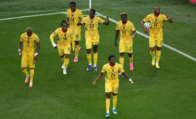 Ghana's Derrick Luckassen (23) celebrates with teammates after scoring their first goal during the World Cup Group L soccer match between Croatia and Ghana in Philadelphia, Saturday, June 27, 2026. (AP Photo/Matt Rourke)
