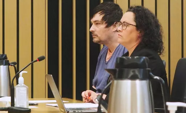 Jesse Calhoun, left, sits in court Wednesday, June 3, 2026, in Portland, Ore., as he is arraigned on a second-degree murder charge over the death of Ashley Real. (Isabel Funk/The Oregonian via AP, Pool)