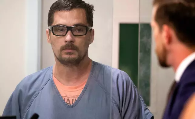 FILE - Jesse Calhoun appears in Multnomah County Circuit Court for his arraignment in Portland, Ore., on June 6, 2024. (Dave Killen/The Oregonian via AP, Pool, File)