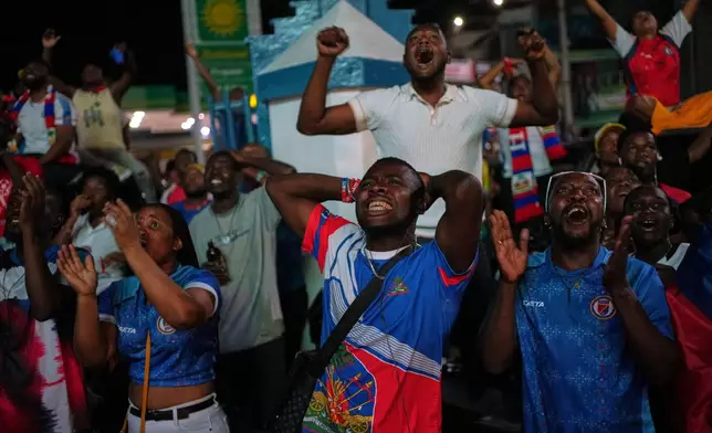Fans attend a World Cup watch party for the match between Brazil and Haiti, in Port-au-Prince, Haiti, Friday, June 19, 2026. (AP Photo/Odelyn Joseph)
