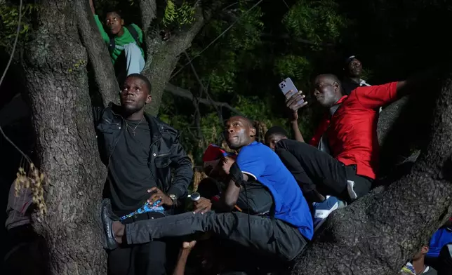 Fans attend a World Cup watch party for the match between Scotland and Haiti in Port-au-Prince, Haiti, Saturday, June 13, 2026. (AP Photo/Odelyn Joseph)