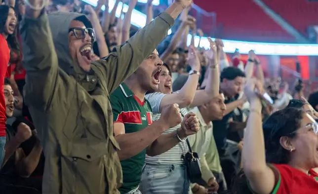 Morocco fans celebrate after a goal scored by their national team in the World Cup Group C soccer match against Brazil, in Moulay Hassan stadium, Rabat, Morocco, Monday, June 13, 2026. (AP Photo)