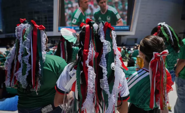 Mexico fans watch a public viewing of the opening match of the World Cup soccer tournament between Mexico and South Africa in San Francisco, Thursday, June 11, 2026. (AP Photo/Eugene Hoshiko)