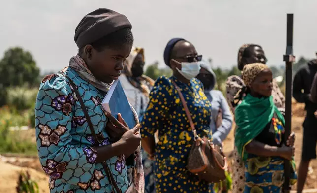 Catholic nuns from the orphanage where Vanisa Anifa, a 6-month-old orphaned girl who died of Ebola, was staying, attends her funeral in Bunia, Congo, Friday, June 19, 2026. (AP Photo/Moses Sawasawa)