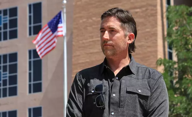 DEA Special Agent David Howell, who filed a whistleblower complaint, poses for a portrait outside the U.S. district courthouse in Albuquerque, N.M., on Friday, June 12, 2026. (AP Photo/Susan Montoya Bryan)