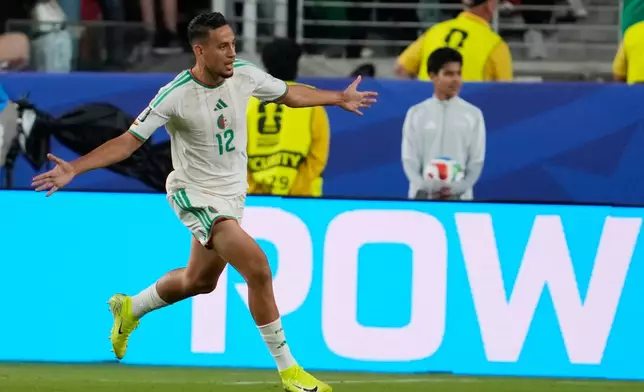 Algeria's Nadhir Benbouali (12) celebrates after scoring a goal during the World Cup Group J soccer match between Jordan and Algeria in Santa Clara, Calif., near San Francisco, Monday, June 22, 2026. (AP Photo/Eugene Hoshiko)