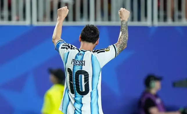 Argentina's Lionel Messi reacts after scoring his third goal during the World Cup Group J soccer match between Argentina and Algeria in Kansas City, Mo., Tuesday, June 16, 2026. (AP Photo/Charlie Riedel)