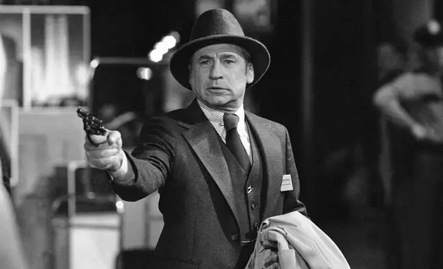 FILE - Actor-director Mel Brooks appears in a scene in his film, "High Anxiety" in May 1977. (AP Photo/Jim Palmer, File)