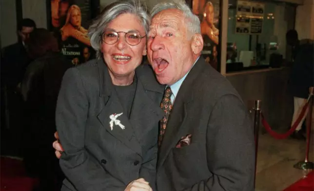 FILE - Actor Anne Bancroft poses with her husband Mel Brooks at the premiere of "Great Expectations" in Los Angeles on Jan. 20, 1998. (AP Photo/Chris Pizzello, File)