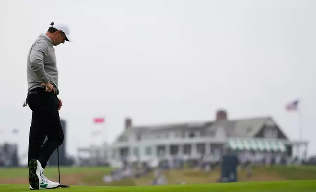 Rory McIlroy, of Northern Ireland, waits to play on the first hole during the first round of the U.S. Open golf tournament at Shinnecock Hills Golf Club in Southampton, N.Y., Thursday, June 18, 2026.(AP Photo/David J. Phillip)