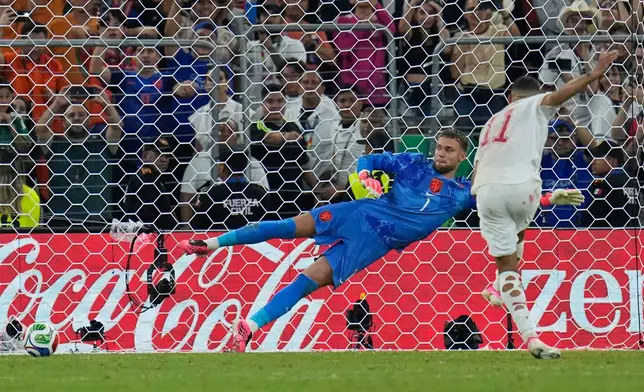 Morocco's Ismael Saibari (11) scores from the penalty spot during the World Cup round of 32 soccer match between the Netherlands and Morocco in Guadalupe, near Monterrey, Mexico, Monday, June 29, 2026. (AP Photo/Ricardo Mazalan)